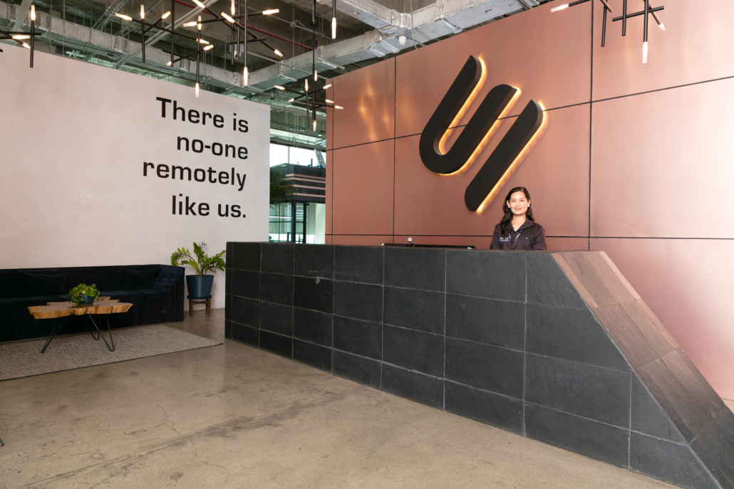 Cybalink Solutions office reception promoting workplace sustainability through a modern, employee-focused work environment