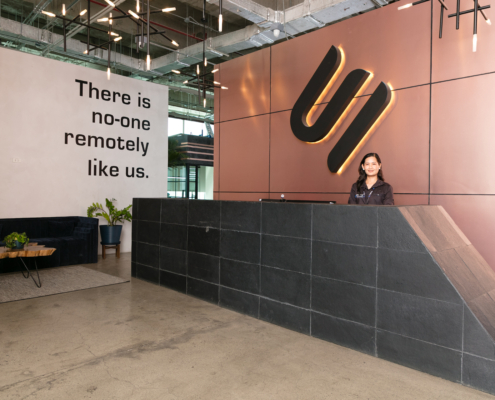 Cybalink Solutions office reception promoting workplace sustainability through a modern, employee-focused work environment